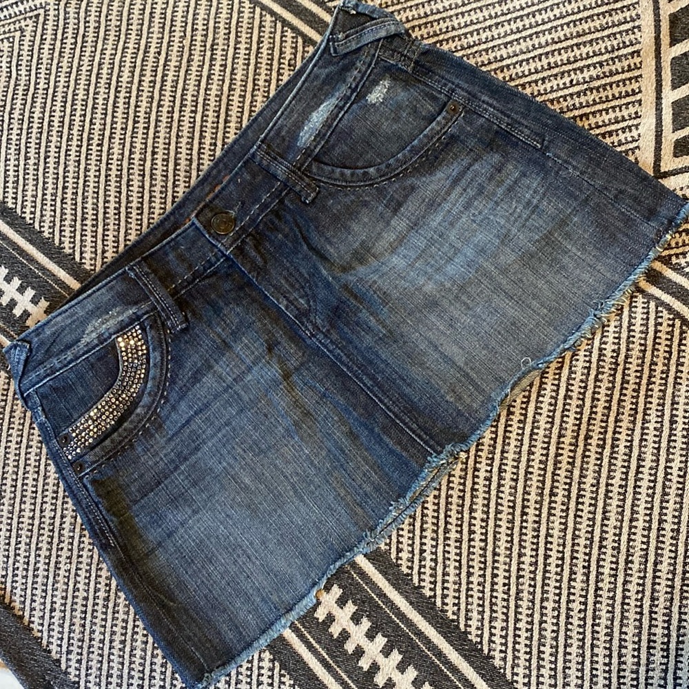Embellished distressed denim mini skirt
